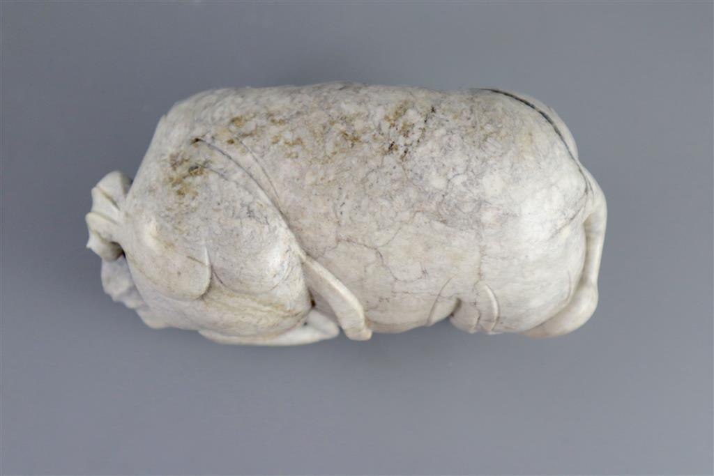 A Chinese burnt jade figure of an elephant, 15.5cm long